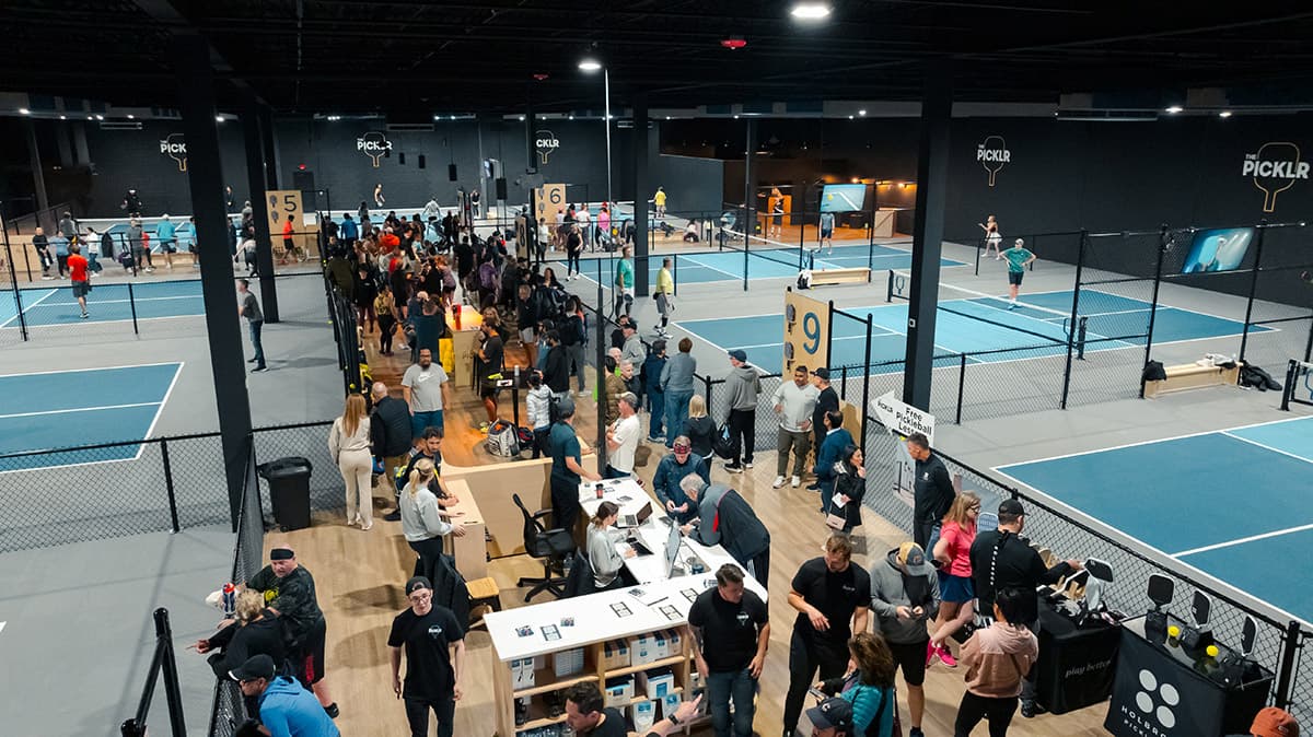 Aerial view of 13 dedicated indoor pickleball courts at The Picklr Lehi